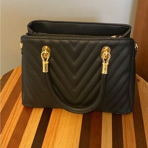 Chic Black Chevron Satchel with Gold Accents